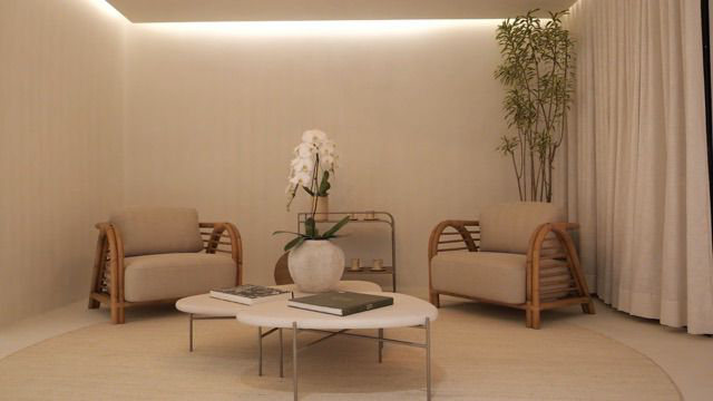Sala da Clínica Seven com poltronas, orquídeas e luz quente